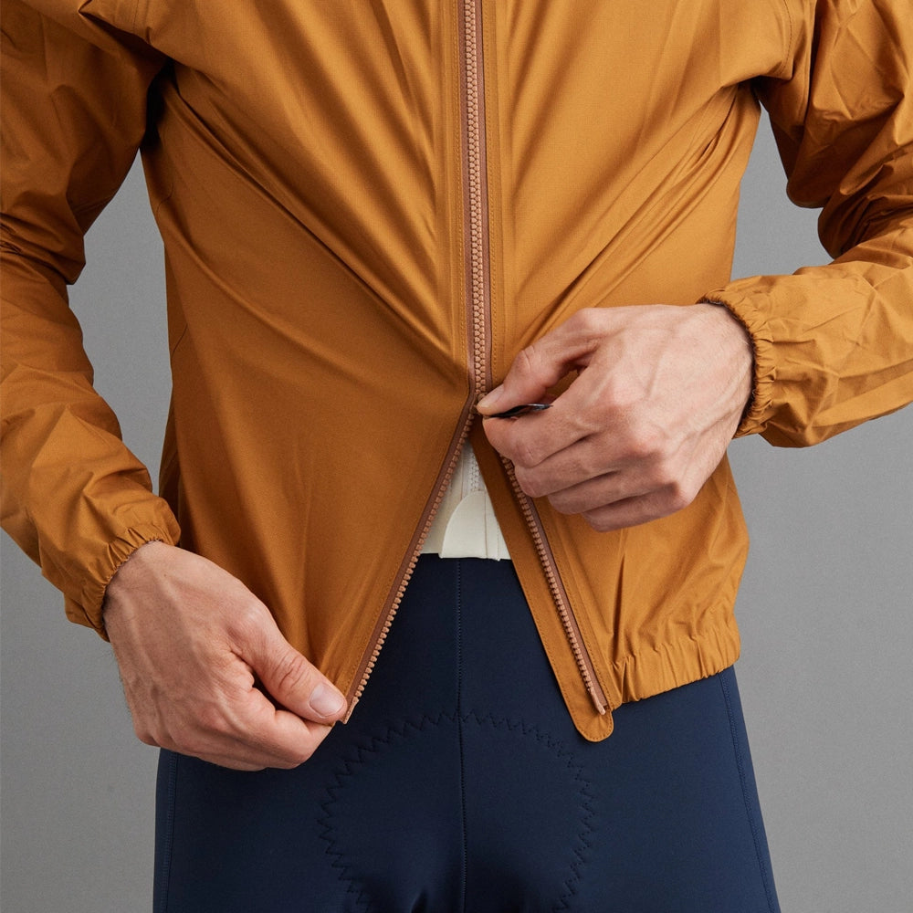 PAS NORMAL STUDIOS Mechanism Pertex Rain Jacket AW23 - Burned Orange